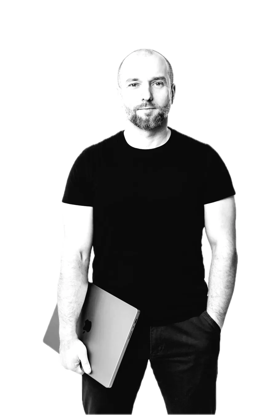 Michał Ostruszka, standing with a laptop under one arm